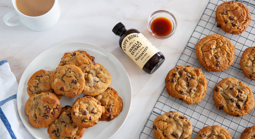 Chocolate chip cookies and a bottle of vanilla extract